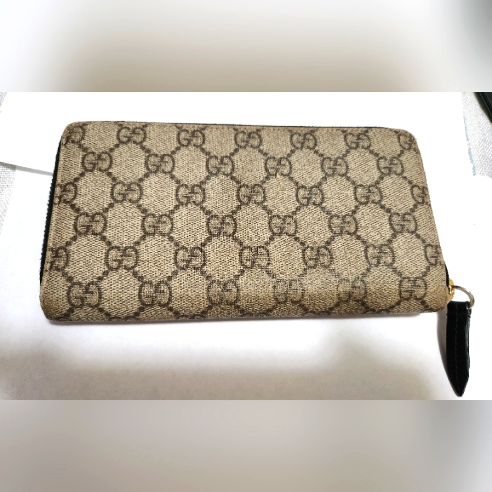 Gucci canvas monogram Guccissima Zippy wallet